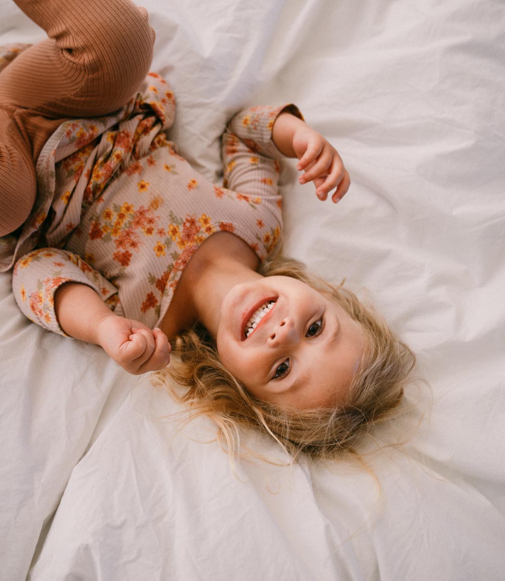Young girl on a cabin bed